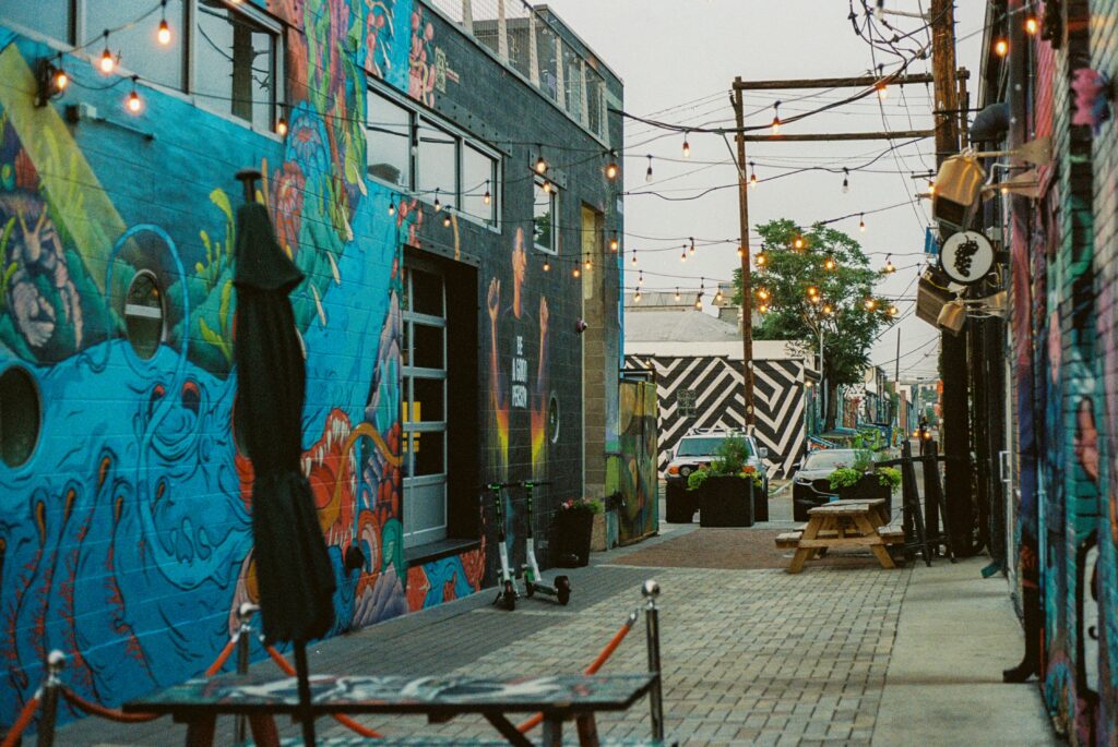 blue and black graffiti on wall during daytime in Colorado