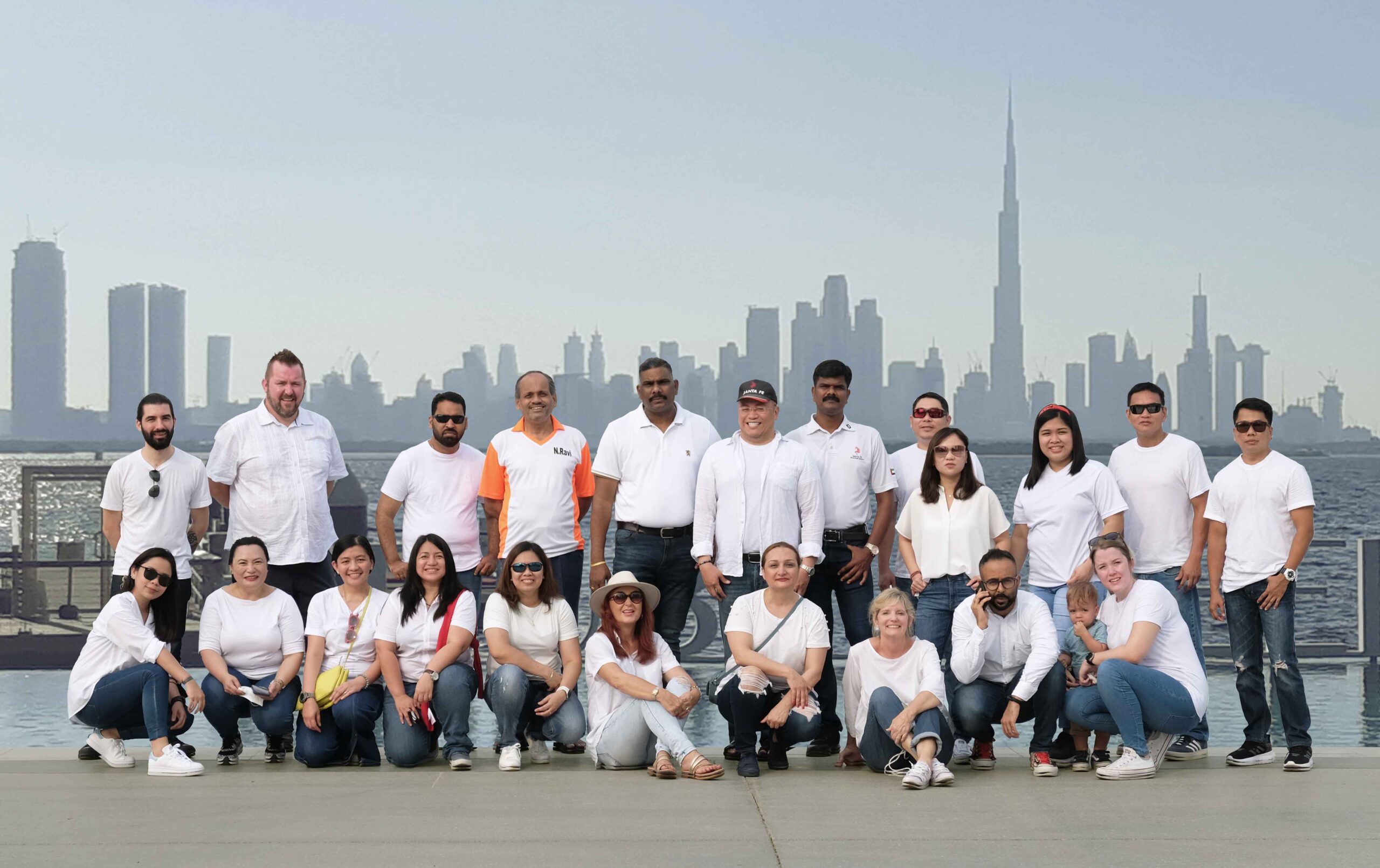 The Santa Fe Dubai team with the Dubai skyline in the background. Ready to help our customers with moves across the world.