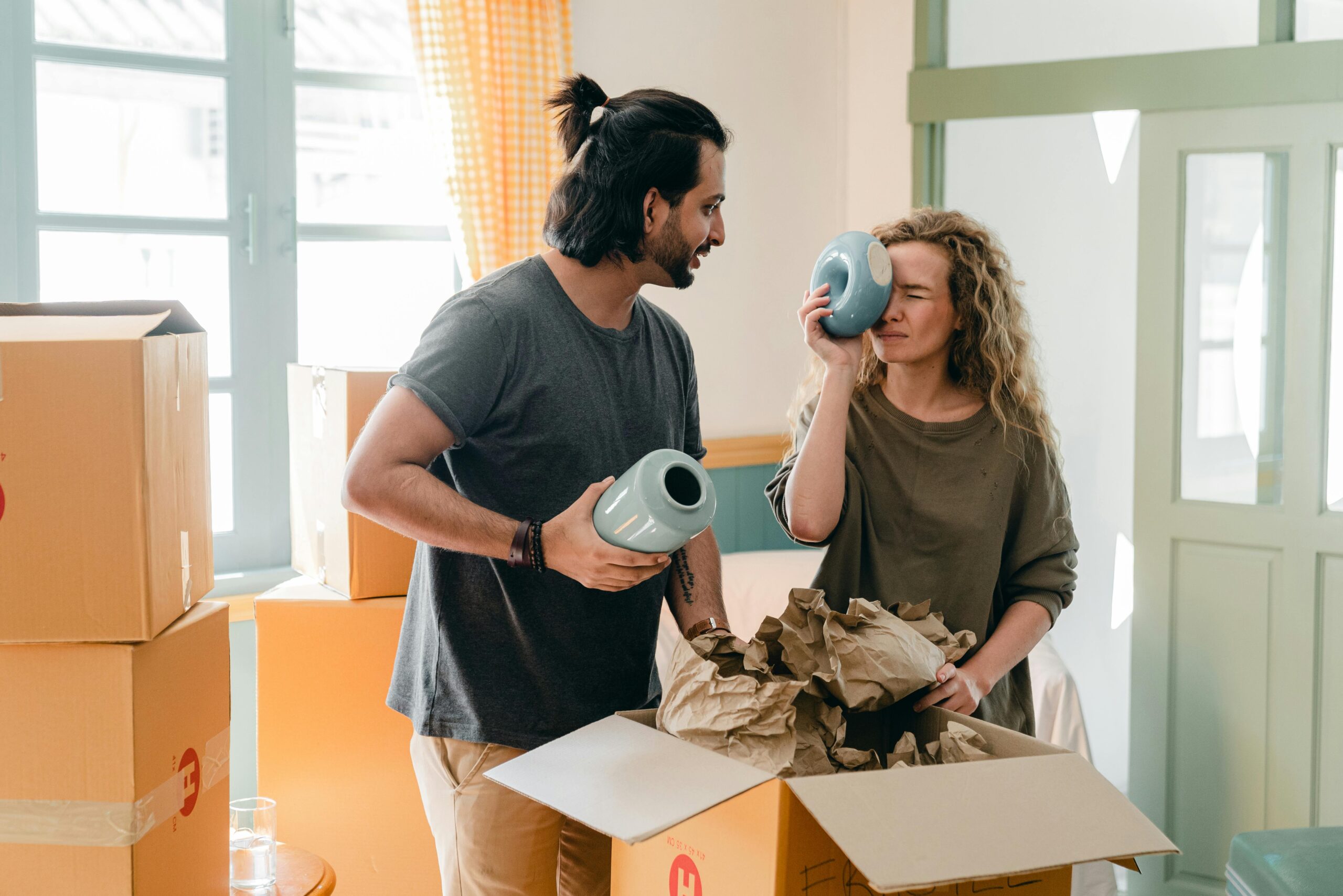 couple packing up their household belongings