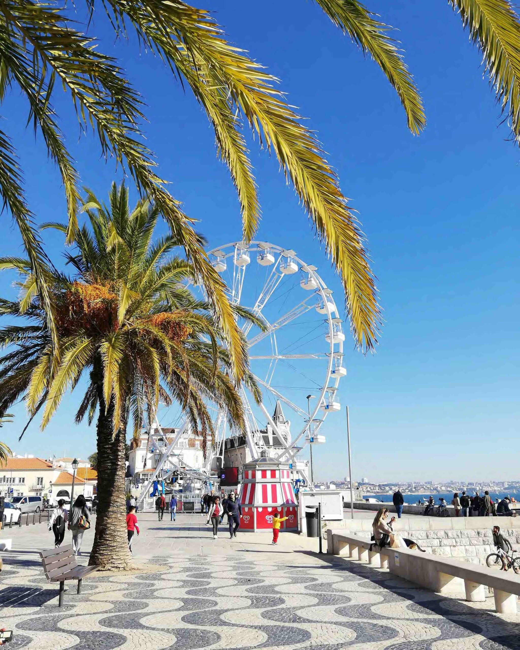 A beautiful blue sky day on the promenade in Portugal right by the sea.